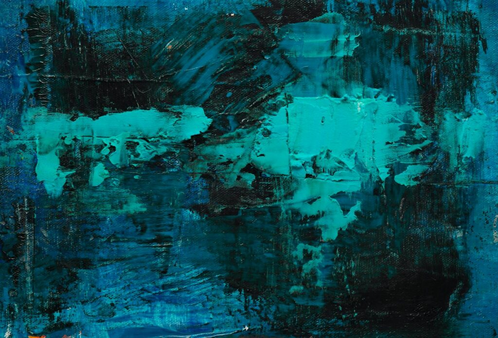 Dynamic abstract painting with expressive blue and turquoise acrylics.